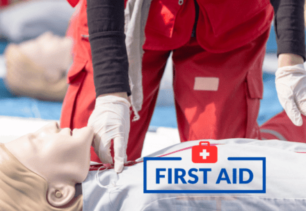 Trainer demonstrating CPR techniques during a first aid course in Brisbane, QLD